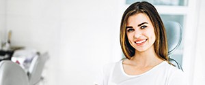 Woman smiling during her visit with best dentist