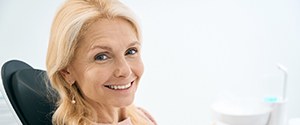 Woman smiling in the dental chair