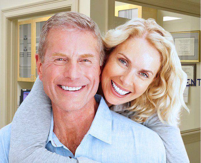 Senior man and woman smiling