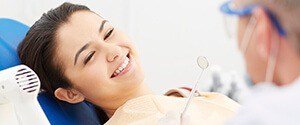 woman smiling at dentist