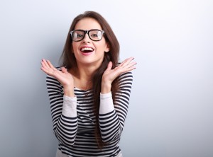 Young woman with healthy smile following soft tissue laser therapy