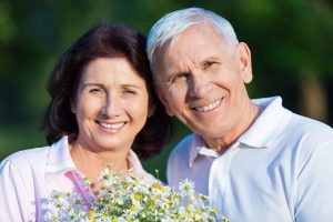 smiling senior couple outdoors