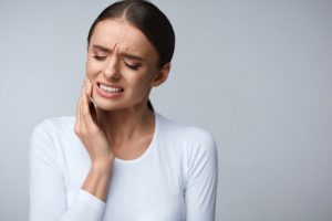 Woman with tooth pain.
