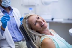 Woman smiling in dental chair