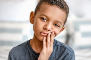 Boy with toothache needs to see his dentist