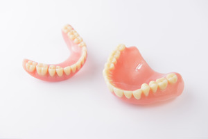 Pictures of dentures on a table
